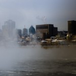 Montreal skyline with rising steam fog