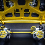Color coordinated rear suspension risers