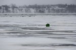 Green ice fishing hut