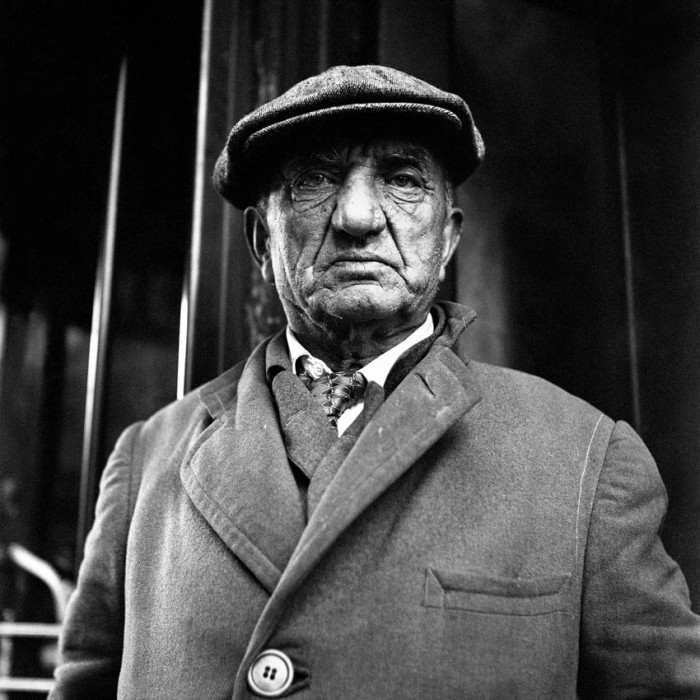 Portrait of man in cap by Vivian Maier 
