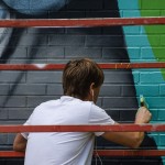 Seth at work on his Mural